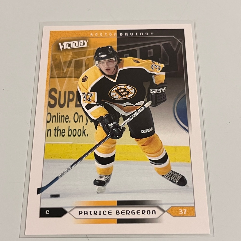 🏒 Patrice Bergeron – 2005-06 Upper Deck Victory #14 (Boston Bruins)